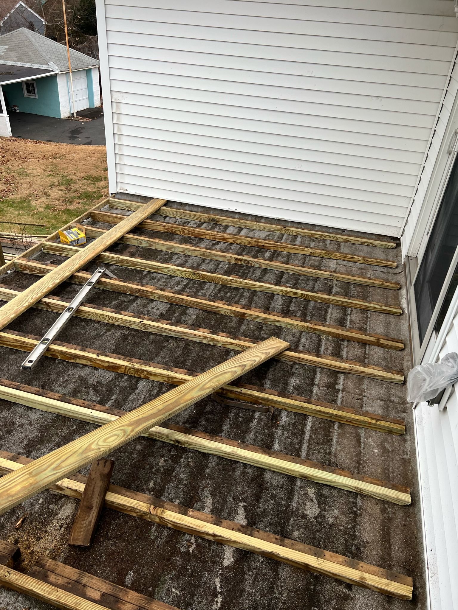 Old fiberglass roof cleared and sleepers installed